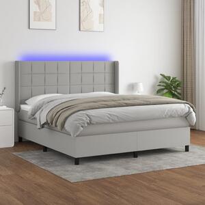 VidaXL Box spring postelja z vzmetnico LED sv. siva 160x200 cm blago