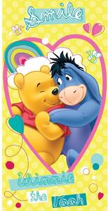 Rumena bombažna otroška brisača 70x140 cm Winnie the Pooh "Smile" – Jerry Fabrics