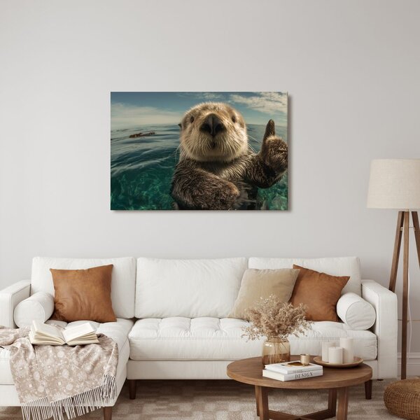 Slika igriva vidra v oceanu