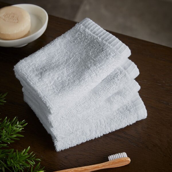 Bele hitro sušeče bombažne brisače v kompletu 4 ks 30x30 cm Quick Dry – Catherine Lansfield