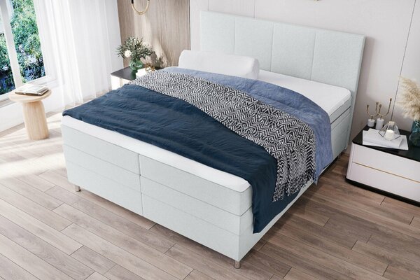 Oblazinjena postelja boxspring CARINA 140x200 cm svetlo siva Vzmetnica: Vzmetnica Bonell