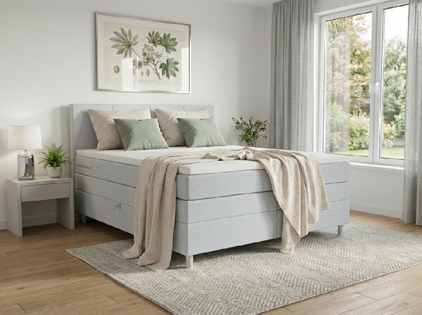 Oblazinjena postelja boxspring CARINA 140x200 cm svetlo siva Vzmetnica: Vzmetnica Bonell