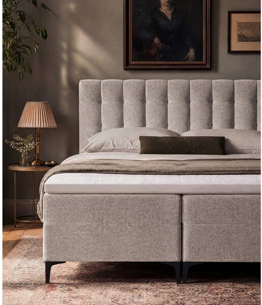 Sivorjava boxspring postelja s prostorom za shranjevanje 180x200 cm Puhala – Makamii