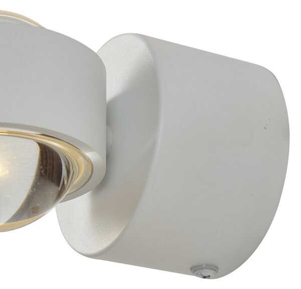Dizajnerska stenska svetilka bela vklj. LED IP44 - Lens