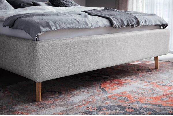Siva oblazinjena zakonska postelja s prostorom za shranjevanje z letvenim dnom 180x200 cm Lotte – Meise Möbel