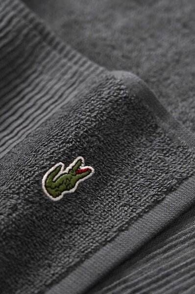 Lacoste Srednje velika bombažna brisača Lacoste 100 x 150 cm