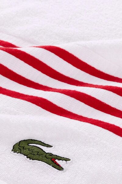 Lacoste Srednje velika bombažna brisača Lacoste LCOURTLI Rouge 90 x 150 cm