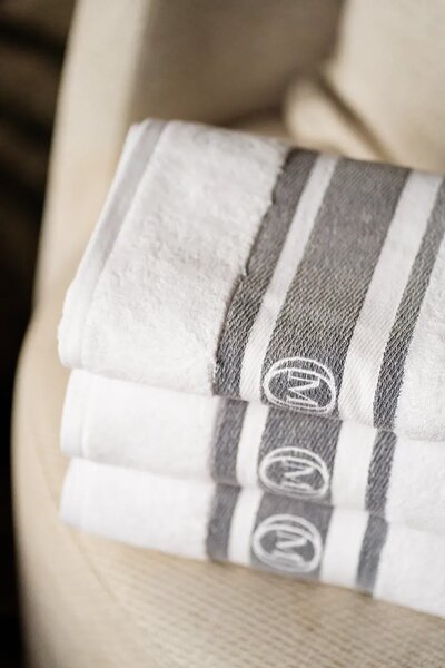 Officine Monogram Velika bombažna brisača Officine Monogram Monogram Linea 100 x 160 cm