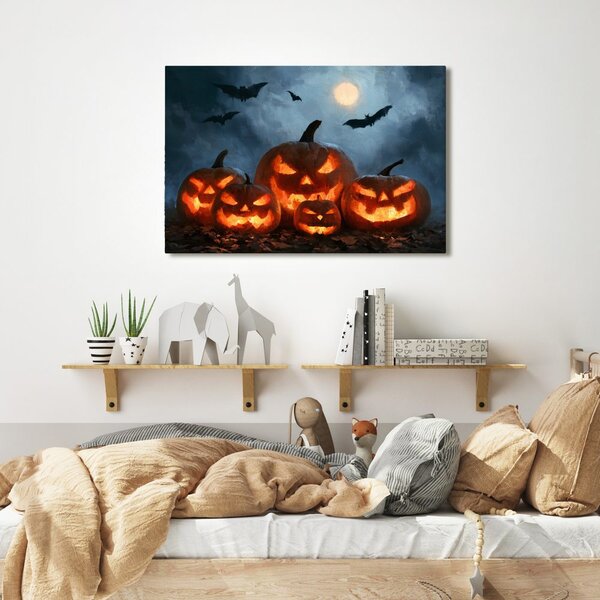 Slika halloweenske buče pod netopirji