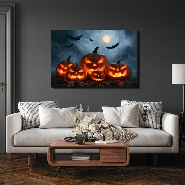 Slika halloweenske buče pod netopirji