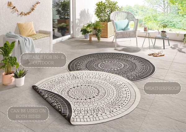 Črna-krem zunanja preproga NORTHRUGS Porto, ⌀ 140 cm