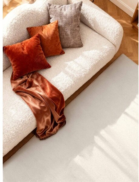Kremno bela ročno tkana volnena preproga 140x200 cm Puristic Knots – Elle Decoration