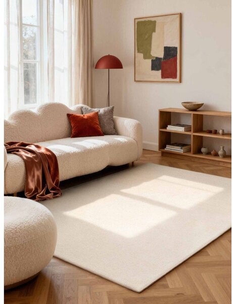 Kremno bela ročno tkana volnena preproga 140x200 cm Puristic Knots – Elle Decoration