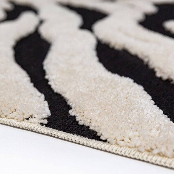 Črno-bela preproga 133x190 cm Esra Zebra – Flair Rugs