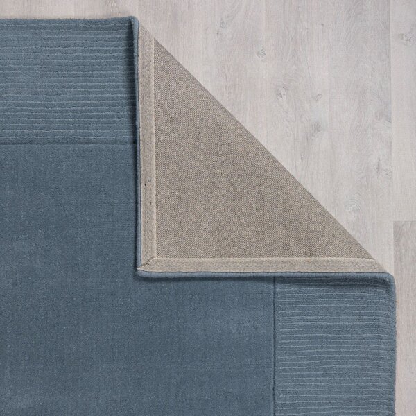 Temno modra ročno tkana volnena preproga 120x170 cm Textured Wool Border – Flair Rugs