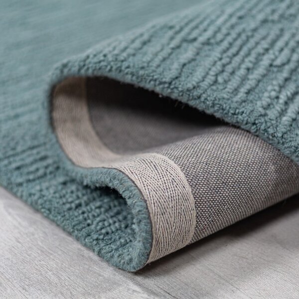 Prašno modra ročno tkana volnena preproga 120x170 cm Harris Boucle – Flair Rugs
