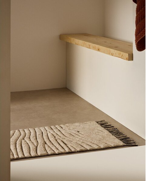 Bež kopalniška preproga 50x70 cm Crilda – Kave Home