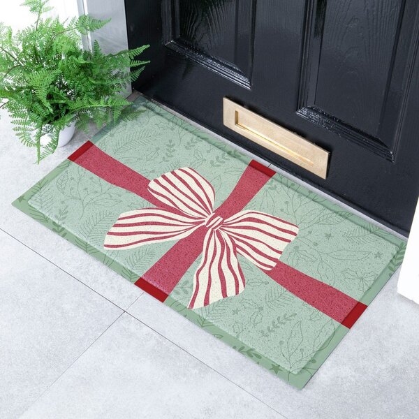 Predpražnik z božičnim motivom iz reciklirane plastike 40x70 cm Red & White Stripe Bow – Artsy Doormats