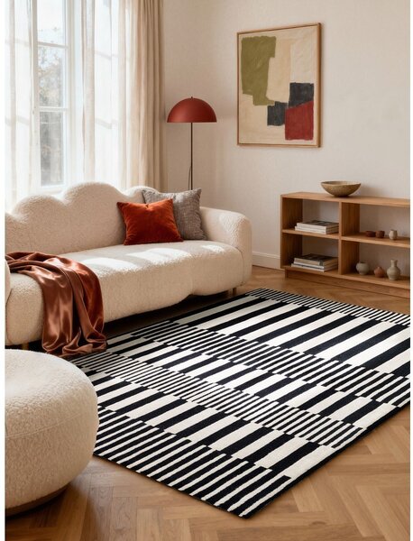 Črno-bela ročno tkana volnena preproga 120x180 cm Stryve Pulse – Elle Decoration