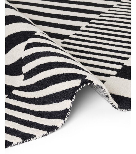 Črno-bela ročno tkana volnena preproga 120x180 cm Stryve Flux – Elle Decoration