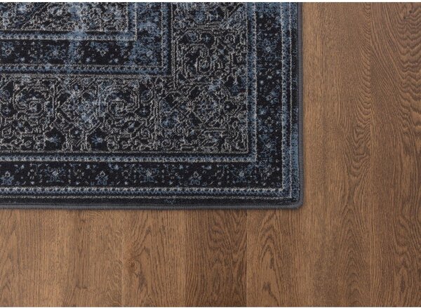 Modra volnena preproga 133x180 cm Difida – Agnella