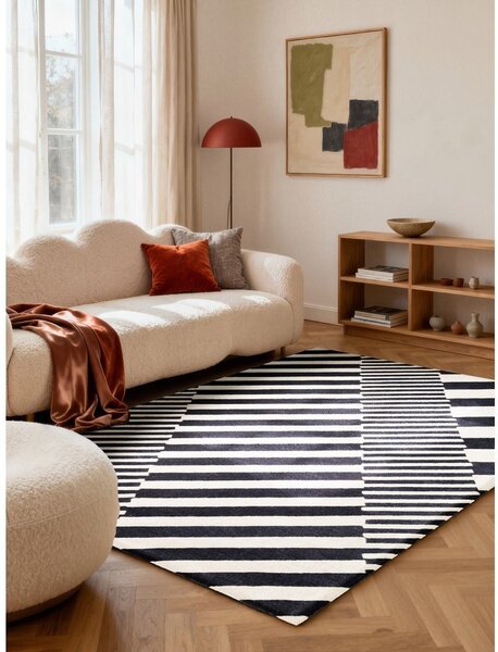 Črno-bela ročno tkana volnena preproga 120x180 cm Stryve Flux – Elle Decoration
