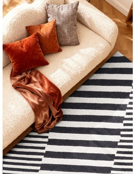 Črno-bela ročno tkana volnena preproga 120x180 cm Stryve Flux – Elle Decoration