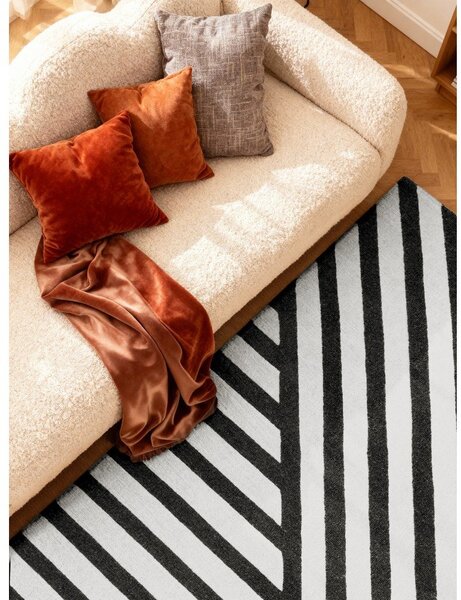Črno-bela ročno tkana volnena preproga 120x180 cm Stryve Noir – Elle Decoration