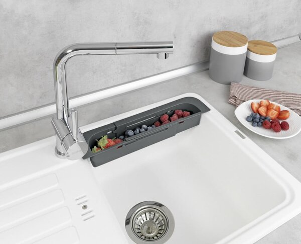 Siv plastičen teleskopski odcejalnik za pomivalno korito 49,5x8,5 cm Fino – Wenko